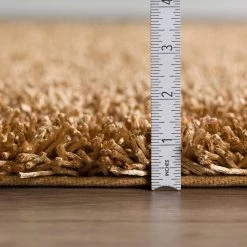 Lavish Beige Shag 8 ft. x 10 ft. Area Rug by Addison Rugs -TrafficMaster Sales beige addison rugs area rugs hdlh69be8x10 c3 1000