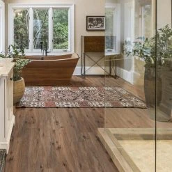 6 in. W x 36 in. L Edwards Oak Rigid Core Click Lock Luxury Vinyl Plank Flooring (32-case/768 sq. ft./pallet) by TrafficMaster -TrafficMaster Sales edwards oak trafficmaster vinyl plank flooring vtrhddevoak636p c3 1000