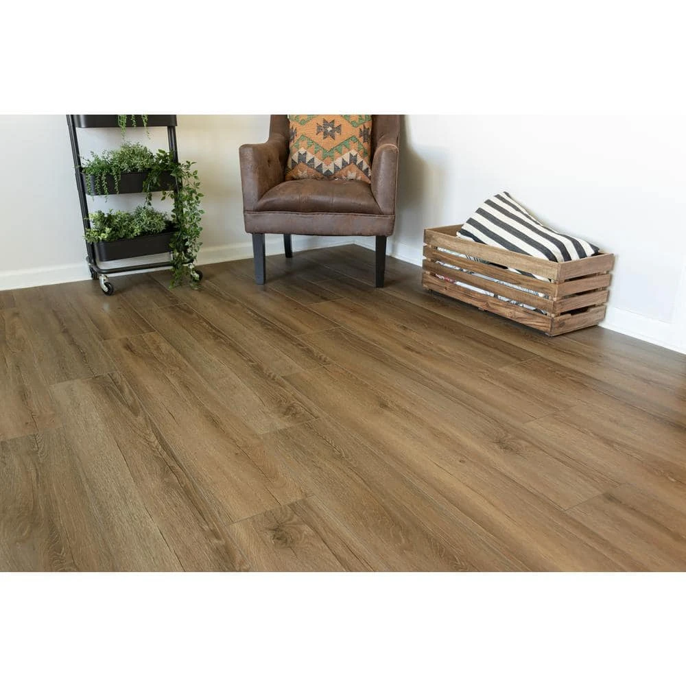 Kettle Keep Oak 8 mm T x 8.03 in. W Water Resistant Laminate Wood Flooring (21.26 sq.ft/Case) by TrafficMaster 4 Kettle Keep Oak 8 mm T x 8.03 in. W Water Resistant Laminate Wood Flooring (21.26 sq.ft/Case) by TrafficMaster - Image 2